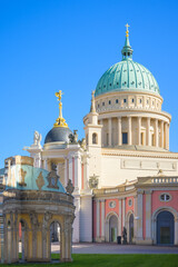 Fortuna Portal at Saint Nicolai Church shines under the sunny sky in Potsdam