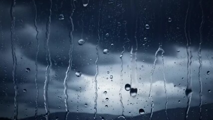 Rain droplets on a window pane with dark stormy clouds outside   - Powered by Adobe