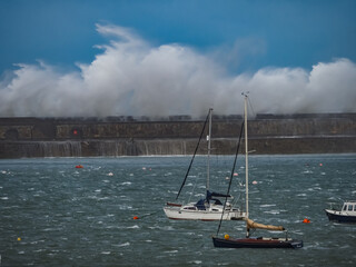 crashing waves over Holyhead breakwater isle of Anglesey