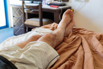 man sleeping on the couch