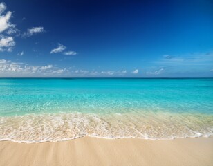 serene beach with clear turquoise water and golden sand under a blue sky
