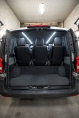 Comfortable interior of a passenger bus with soft seats