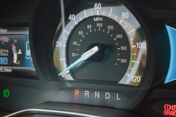 Close up of car speedometer while parked