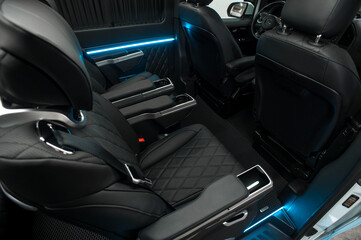 Comfortable interior of a passenger bus with soft seats