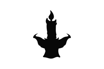Silhouette of a gothic candelabra with a single lit candle casting shadows