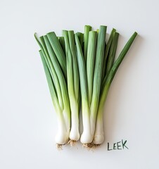 Obraz premium Fresh leeks neatly arranged on a white background showcasing their vibrant greens and creamy whites in a clean, modern style