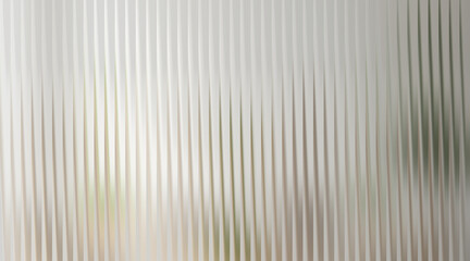 Fototapeta premium Abstract vertical ribbed texture with light grey and green tones