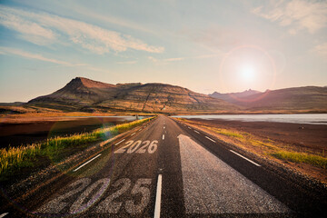 A beautiful scenic road that leads toward the bright future, displaying the years 2025 and 2026 boldly on its surface