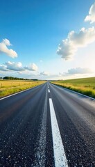 Fototapeta premium A crisp, clean white line painted on a dark asphalt road, stretching towards the horizon Perfect for concepts of direction, journey, freedom, and simplicity , texture, single, dark