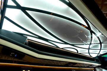 Fototapeta premium Comfortable interior of a passenger bus with soft seats