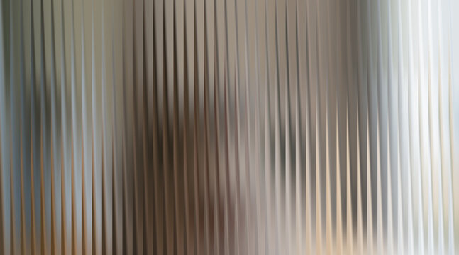 Abstract vertical ribbed glass texture with soft light and shadow effect