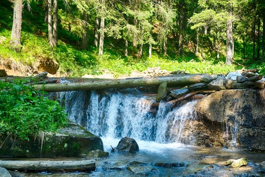 beautiful waterfall in Carpathian mountains Ukraine