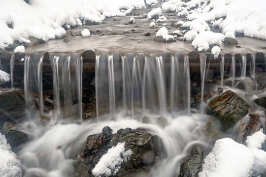 beautiful waterfall in Carpathian mountains Ukraine