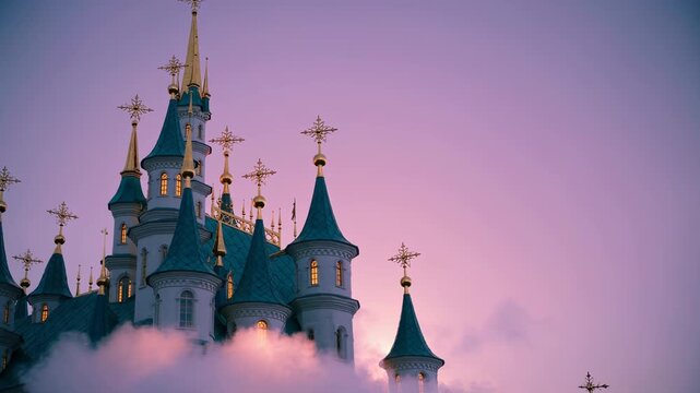 Castle towers rise above clouds at sunset. Fantasy dream sky glows with magic light. Elegant architecture and turrets shine in pink cloud mist. Magical scene with tower, castle, sunset, sky, dream