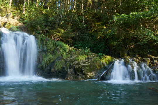 beautiful waterfall in Carpathian mountains Ukraine
