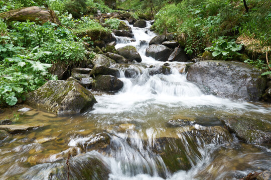 beautiful waterfall in Carpathian mountains Ukraine