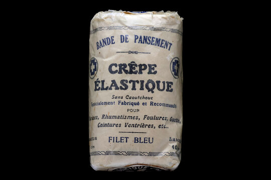 Vieux pansement  en cr&ecirc;pe &eacute;lastique de Filet bleu