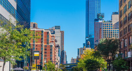 Fototapeta premium Buildings in Midtwon Manhattan under a clear sky