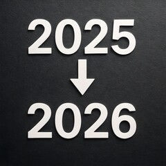 2025 to 2026: New Year Transition With Down Arrow and White Numerals On Dark Background