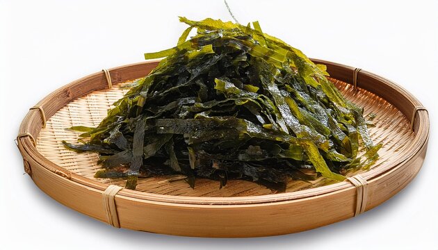 closeup heap of green laver ulva lactuca or sea lettuce seaweed cutout in bamboo tray