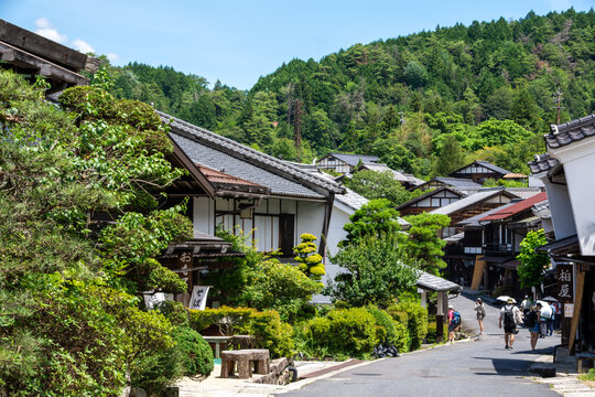 Nakasenko, Japan - July 19, 2025: Street with historic houses and and trees