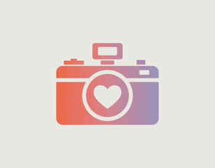 This image features a stylish camera design with a heart shape incorporated into its lens, representing passion for photography and emotional connections captured through images.