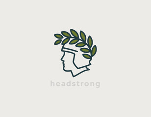 This logo features a stylized helmet surrounded by olive leaves, symbolizing strength, bravery, and resilience in a modern and artistic representation.