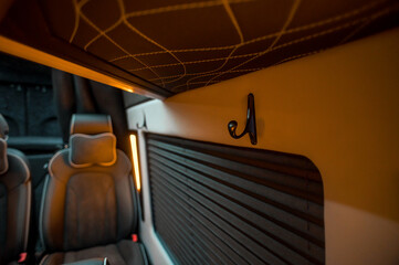 Comfortable interior of a passenger bus with soft seats