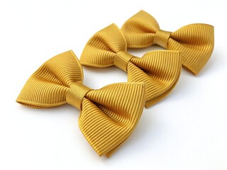 Three golden yellow ribbon bows isolated on white background, perfect for crafts, gifts, and decorations, adding a touch of elegance and charm