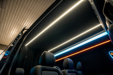Comfortable interior of a passenger bus with soft seats
