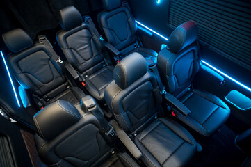 Comfortable interior of a passenger bus with soft seats