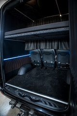 Comfortable interior of a passenger bus with soft seats