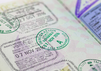 Close up Immigration VISA Stamps on Passport.
