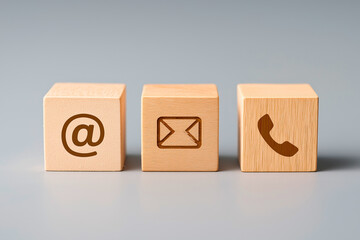 Wooden Contact Icons on Gray Background Business Communication Concept