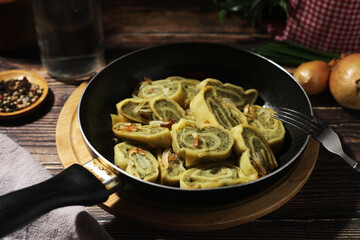Traditional German Swabian dish maultaschen cut and fried with onion