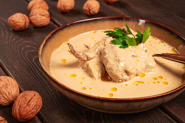 Satsivi, Georgian dish, chicken in nut sauce, cold appetizer,rustic, no people, homemade,