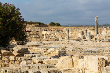 Fototapeta premium Ruins and remnants with columns of the Sanctuary and Temple of Apollo Hylates in an ancient Greek city-state called Kourion on the island of Cyprus