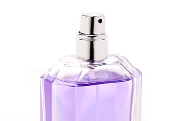 A bottle of perfume with a silver top