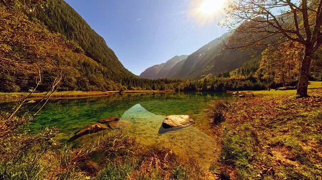 4K Timelapse alpine summer video with moving clouds and reflections at Lake Blausee, Obersulzbachtal valley, Neukirchen am Gro&szlig;venediger, Salzburg, Austria