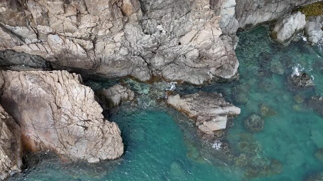 Footage of ocean waves crashing into the cliffs at Eo Gio in Quy Nhon, Binh Dinh Province, Vietnam