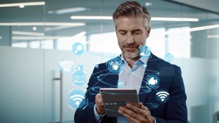 Businessman using video tablet interface to manage digital data - Powered by Adobe