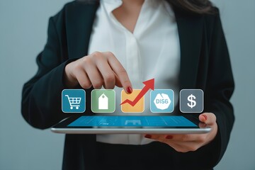Businesswoman using a tablet with digital icons showing growth sales and online shopping for business and finance concepts