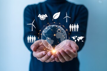 Hands holding a digital globe with renewable energy icons symbolizing sustainability and environmental responsibility for corporate social responsibility initiatives
