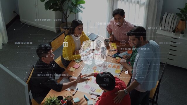 A diverse team collaborates on an artificial intelligence project in a modern office space, showcasing digital tools and innovative thinking for effective communication. Raster