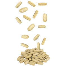 Falling garlic supplement pills on white background