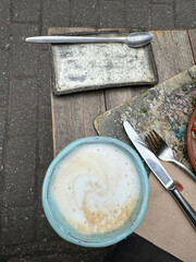 Overhead Coffee and Utensils on Rustic Outdoor Table