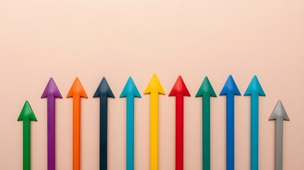 A vibrant row of colorful arrows points upward, demonstrating progress and direction on a simple background.