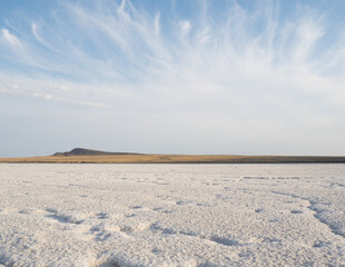 Landscape of salt lake Baskunchak. View of Mount Bolshoe Bogdo. Astrakhan region. Russian landscape.