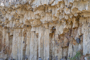 Columnar jointing. Junction Butte Basalt（ Pliocene ) - Includes some gravel.  near Devils Den, Grand Loop Road, Yellowstone National Park , Wyoming. 

