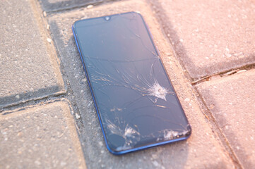 A smartphone with a broken screen
